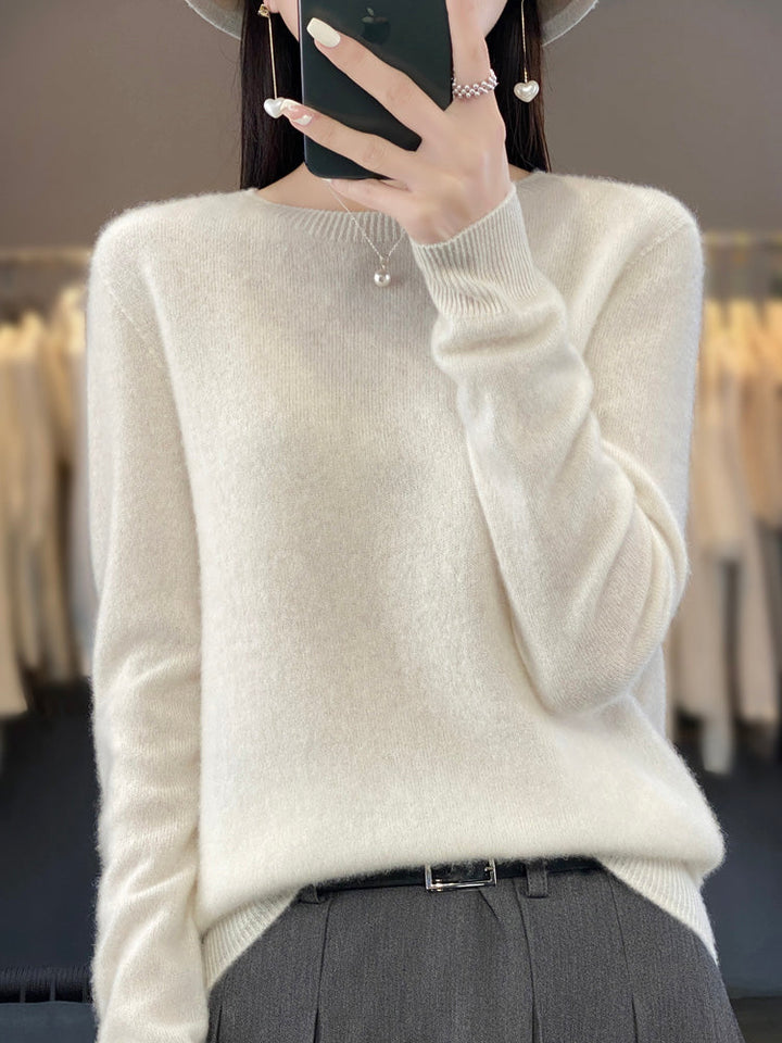 Versatile women's pullover sweater, a cozy crewneck knit for all-day comfort & style.