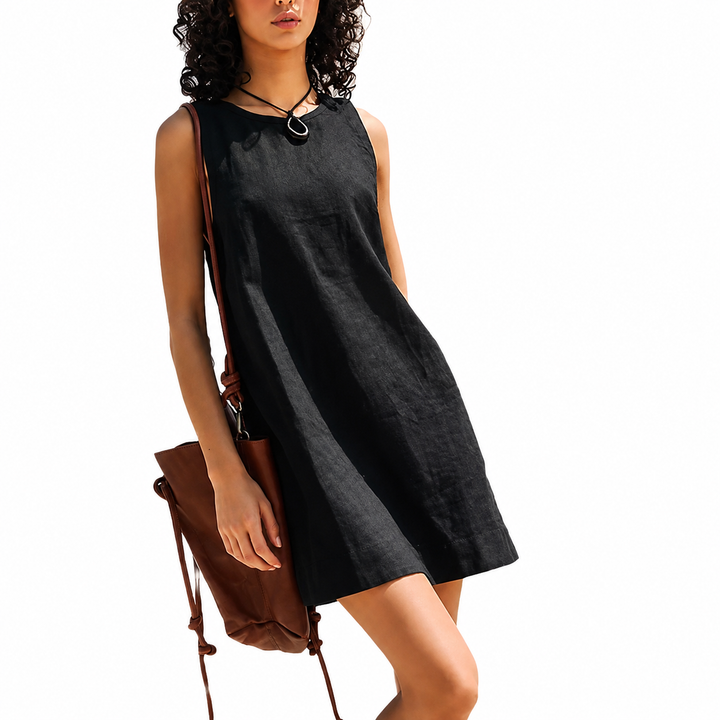 Sleeveless mini shift dress with a round neck, perfect for women's summer fashion. Comfortable and stylish casual wear.