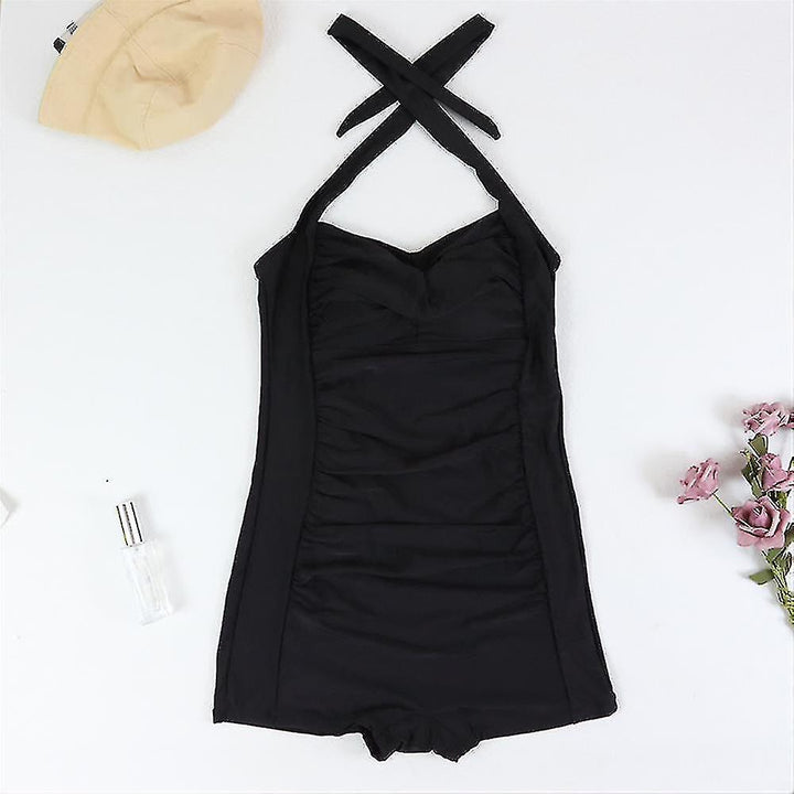 Chic women's one-piece swimsuit: ruched details, halter top, sweetheart neckline, and stylish boyleg coverage.