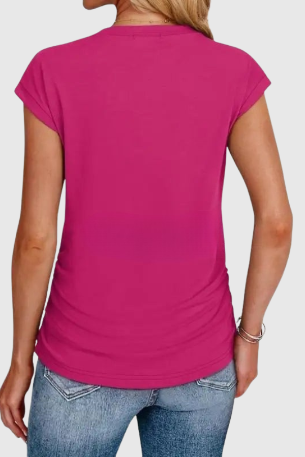 Fashionable women's tunic top, ruched side detail. A loose fit, short sleeve blouse ideal for warm weather.