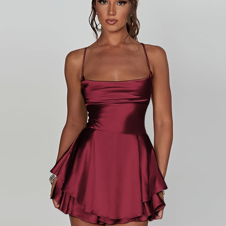 Fashionable women's homecoming mini dress with a ruched top, tiered skirt, and fit & flare design.
