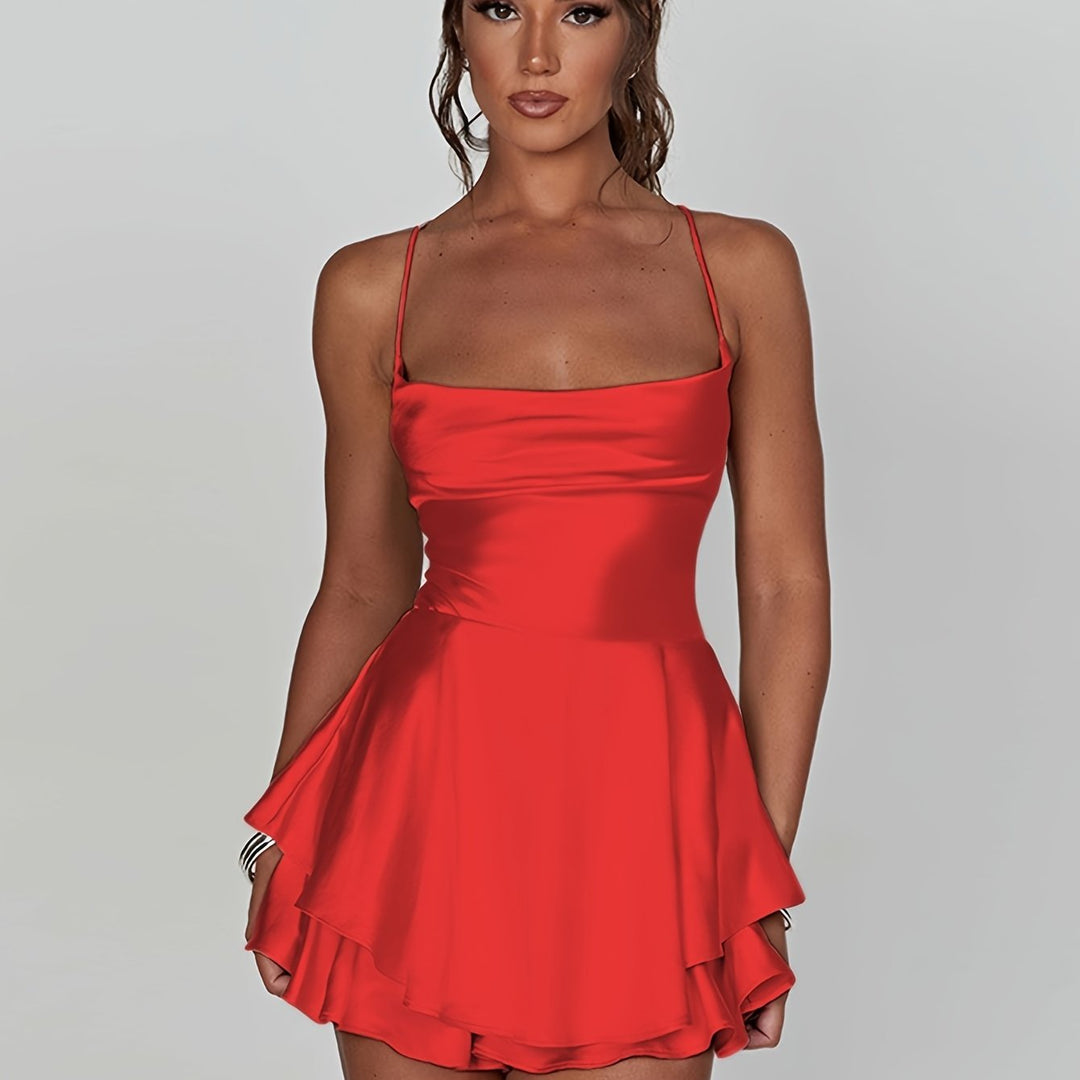 Chic women's party mini dress, ruched design with a tiered skirt & adjustable straps, modern style.