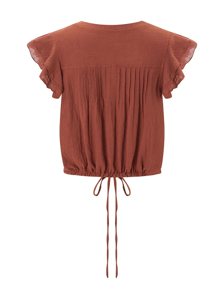 Chic women's short sleeve ruffle crop top, lightweight and perfect for beach & summer fashion.