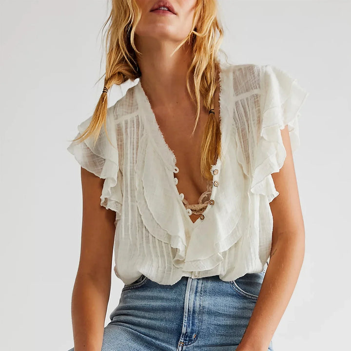 Trendy women's cropped ruffle top, a lightweight summer top with short sleeves.