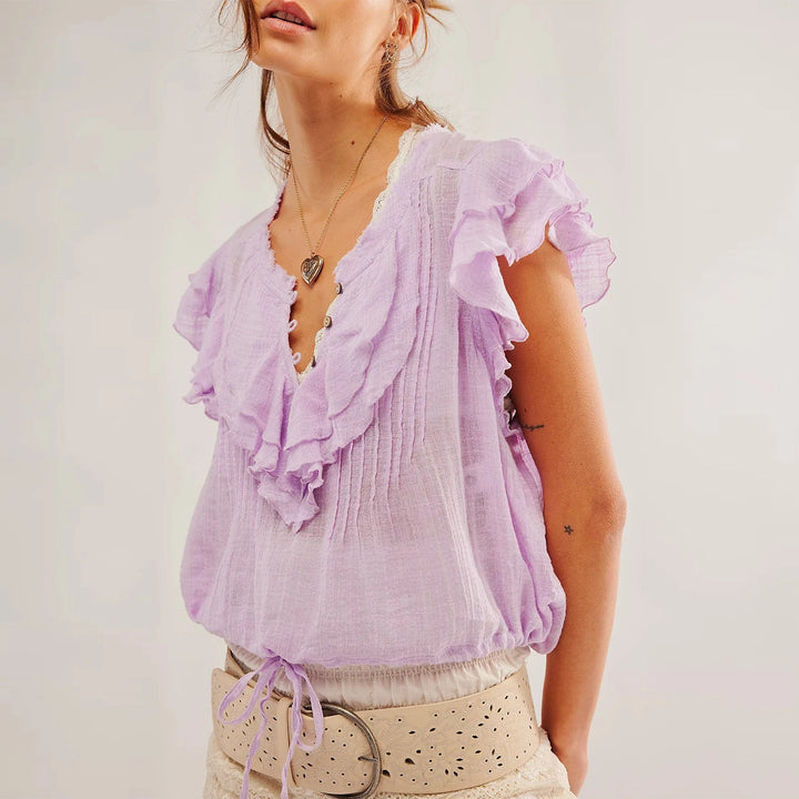 Lightweight women's ruffle crop top, ideal for beach vacations and casual summer outfits.