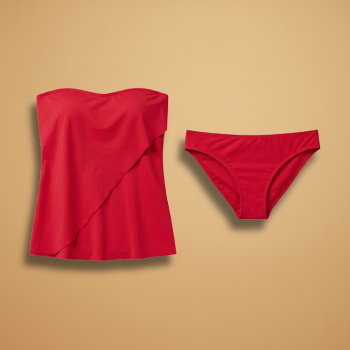 Elegant women's ruffle overlay bandeau tankini top with a matching mid-rise bottom. Perfect resort wear.