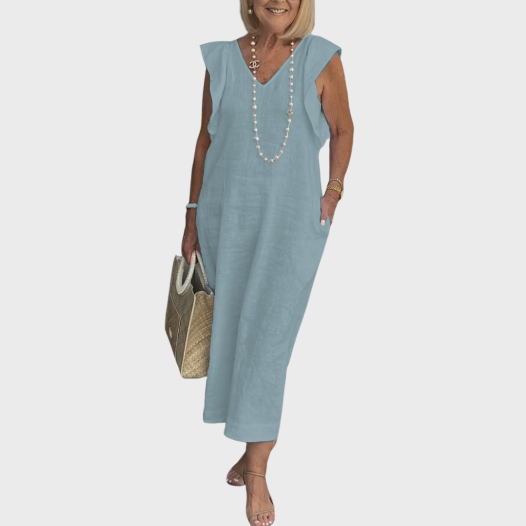 Casual comfortable women's maxi dress with V-neck, sleeveless design, ruffle shoulders, and useful pockets.