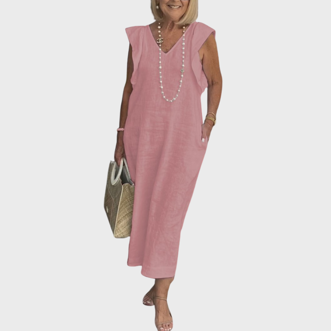 Comfortable flowy women's sleeveless V-neck maxi dress with ruffle shoulders & pockets for vacation style.