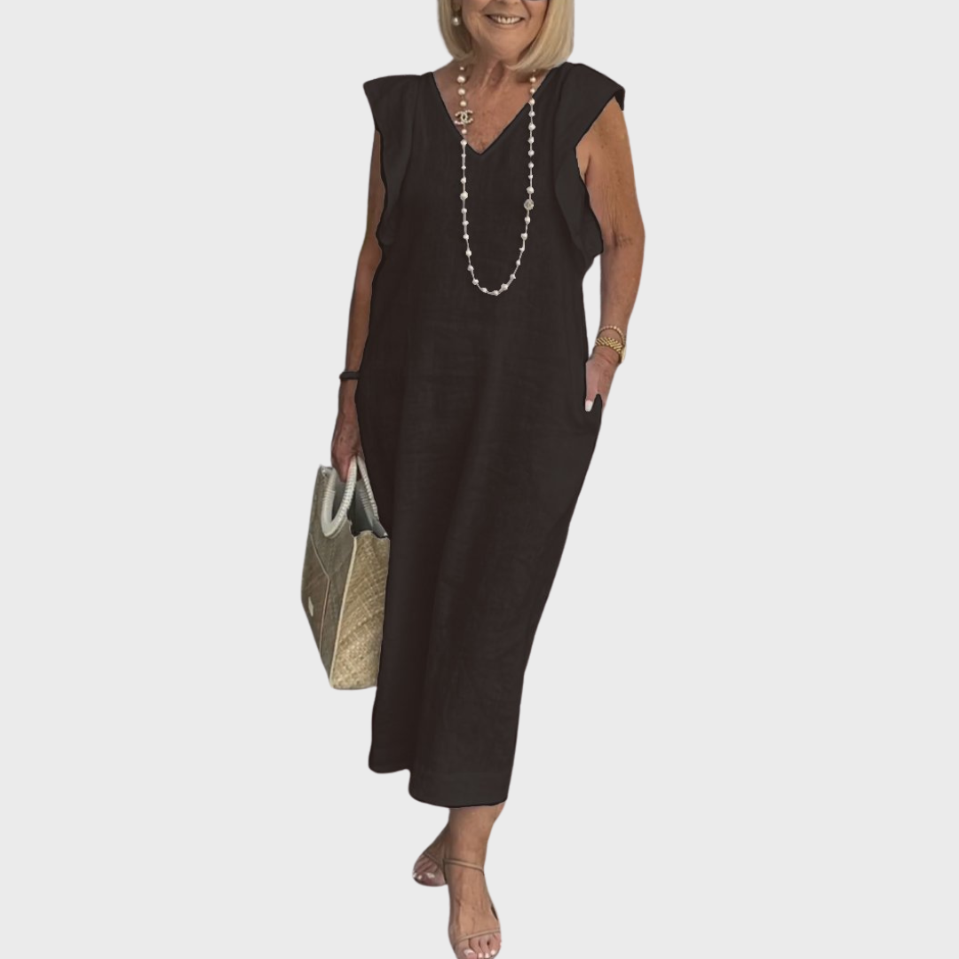 Chic women's ruffle shoulder V-neck sleeveless maxi dress with discreet pockets, perfect for elegant summer fashion.