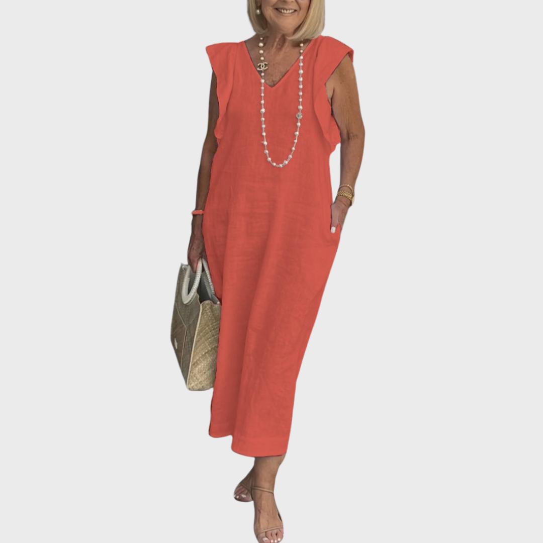 Trendy V-neck sleeveless maxi dress for women, featuring stylish ruffle shoulders and convenient pockets.