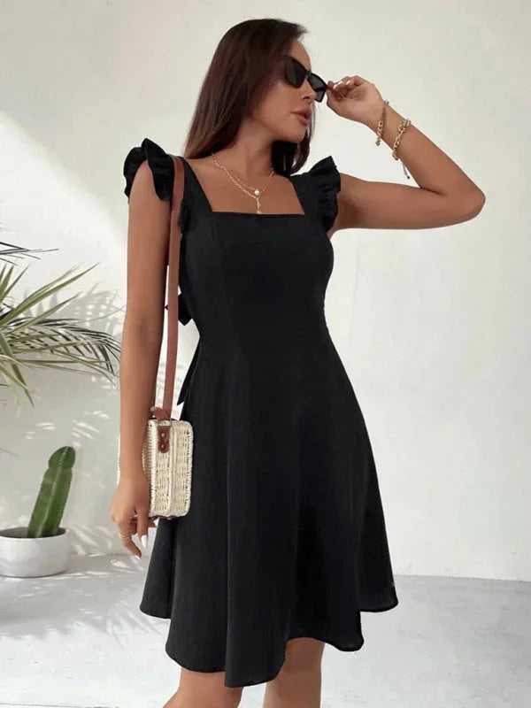 Stylish A-line mini dress with ruffle straps, square neckline, and a cute bow back for women.