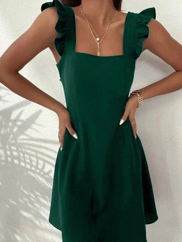 Cute casual A-line mini dress with playful ruffle straps and an adorable bow on the back.