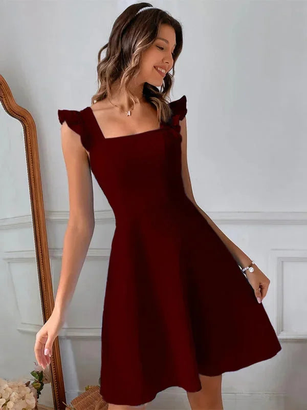 Charming women's ruffle strap mini dress, A-line style, featuring a delicate and sweet bow back.