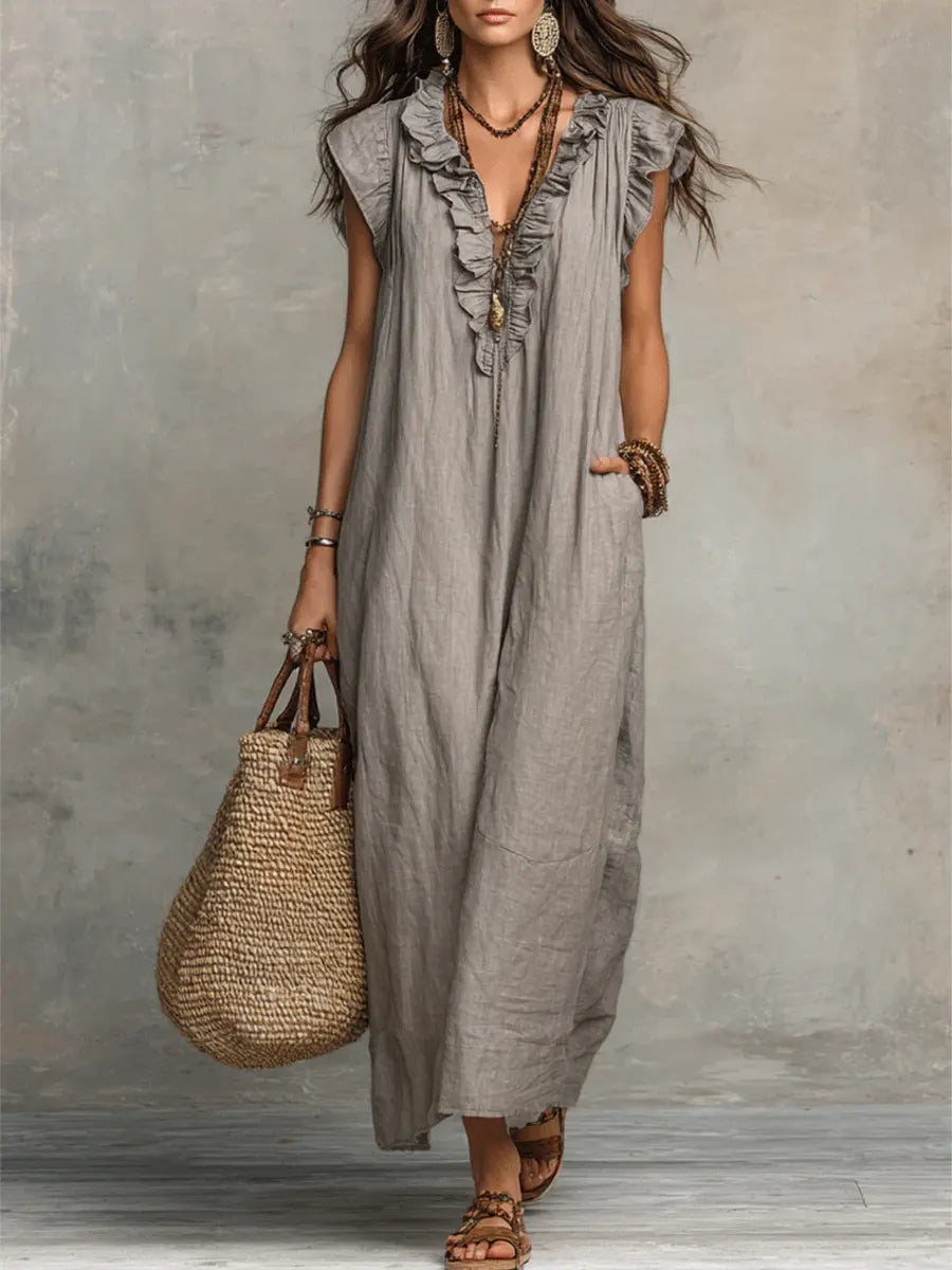 Women's Ruffle V-Neck Flutter Sleeve Maxi Dress with convenient side pockets, perfect for summer.