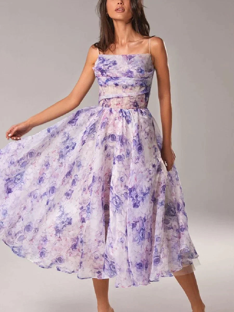 Women's sculpted strapless cocktail midi dress with elegant floral print for special occasions.