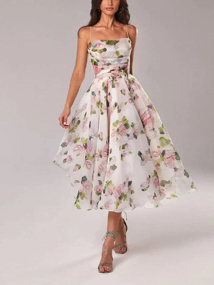 Elegant women's strapless evening dress featuring a sculpted silhouette & sophisticated floral pattern.