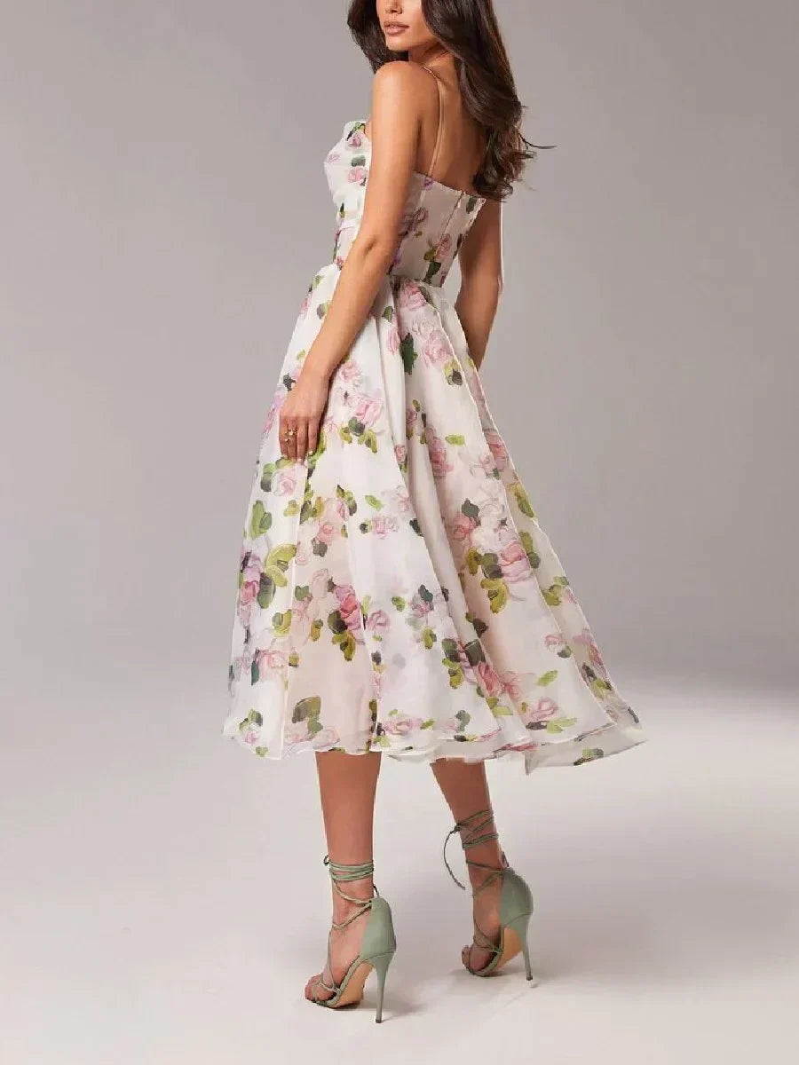 Stylish women's strapless party dress in a sculpted floral print, perfect for cocktail parties & events.