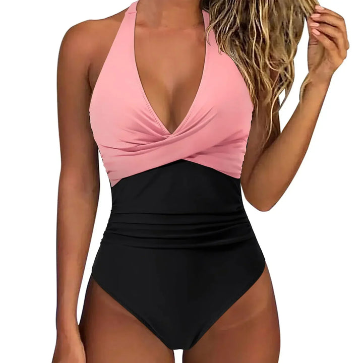 Quick-dry women's one-piece swimsuit, sculpting fit, halter neck, and effective tummy control.