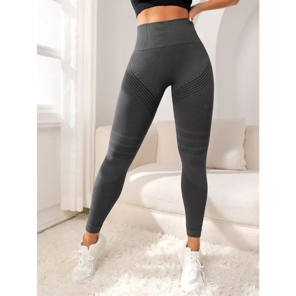 Seamless high waist workout leggings for women. Booty-lifting fit, perfect for activewear.