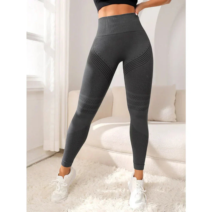 Seamless high waist workout leggings for women. Booty-lifting fit, perfect for activewear.