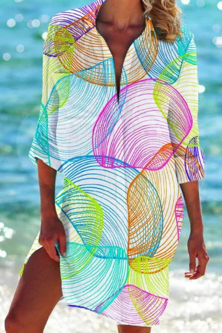 Trendy women's button-down beach cover-up with seashell coral print, ideal for summer.