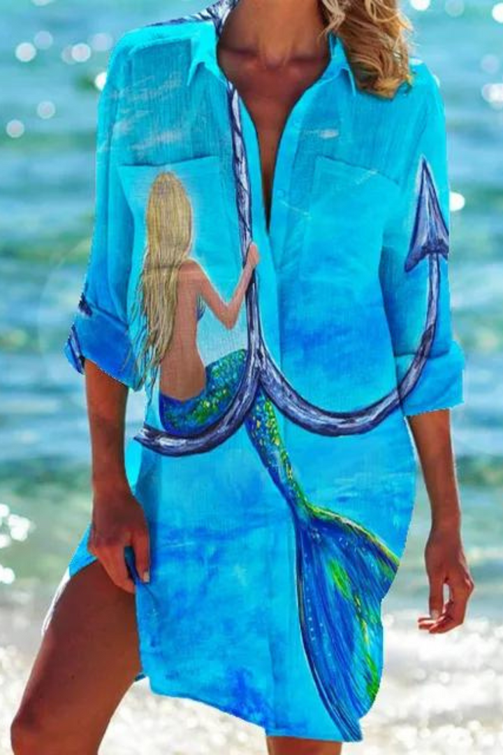 Women's seashell coral print button-down beach cover-up, perfect for vacation.