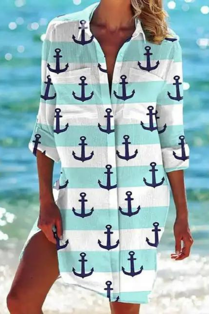 Stylish women's coral & seashell print button-down beach cover-up.