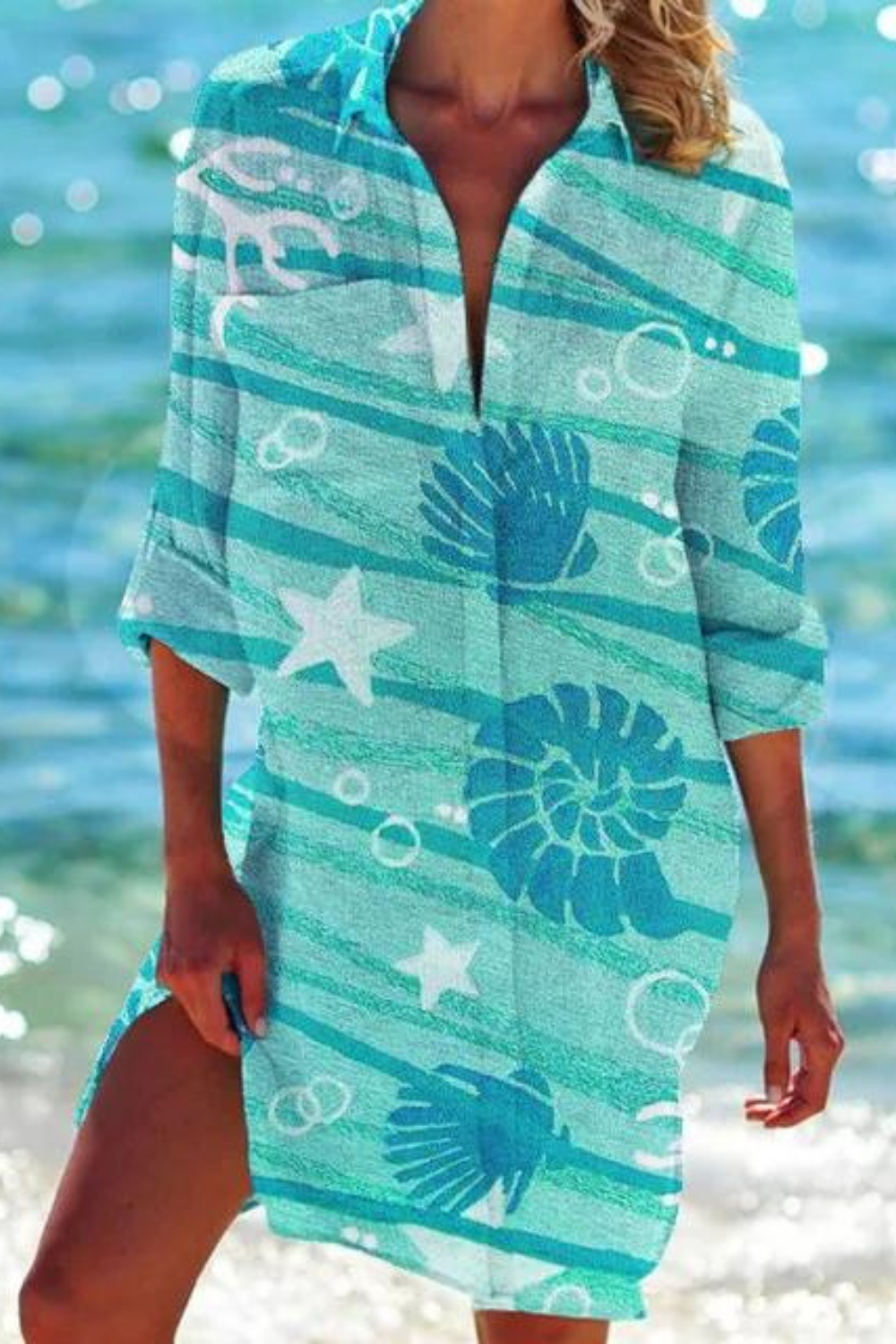 Loose-fit women's button-down tunic beach cover-up, elegant seashell coral design.