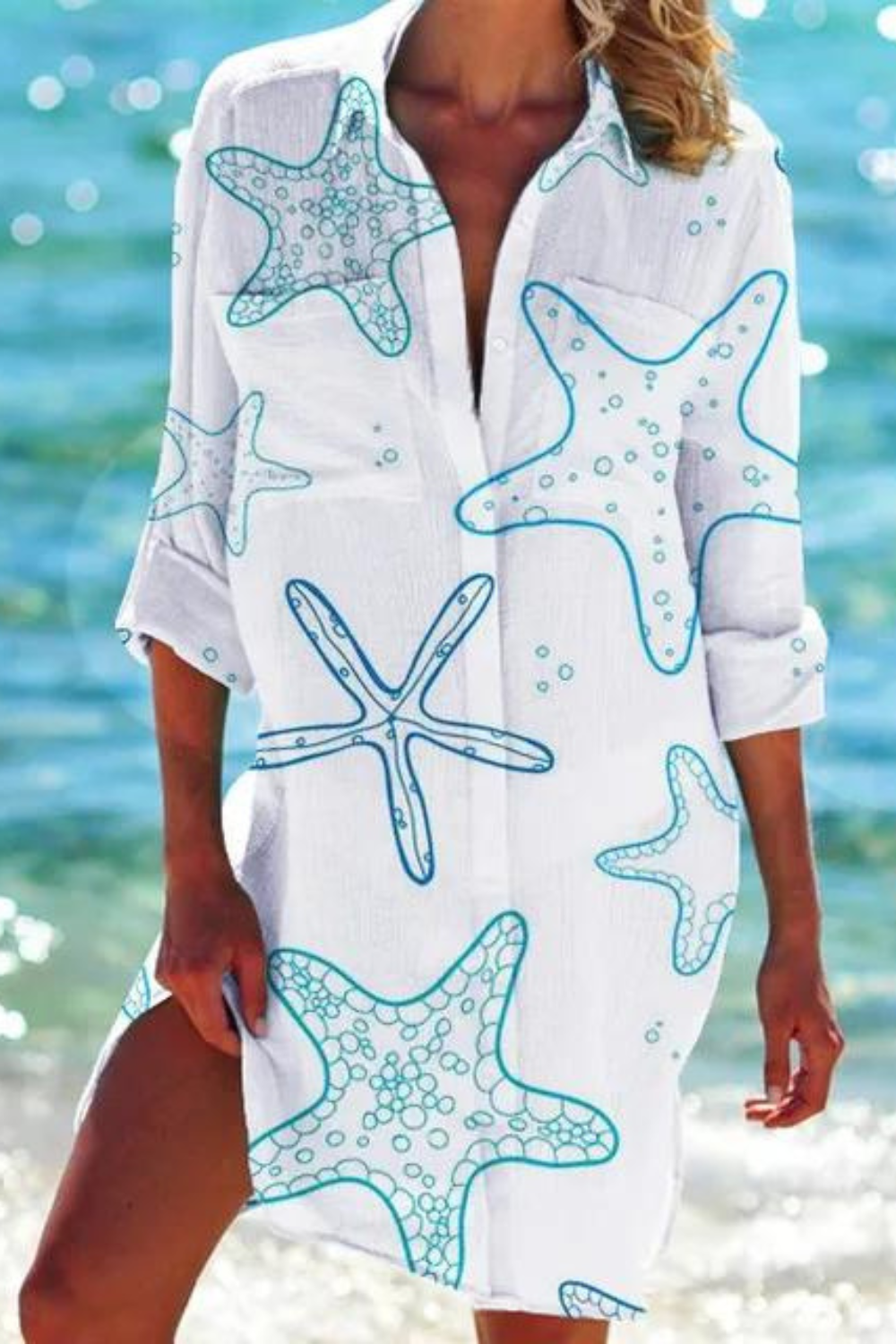 Women's seashell coral print button-down swimsuit cover-up for resort vacation.