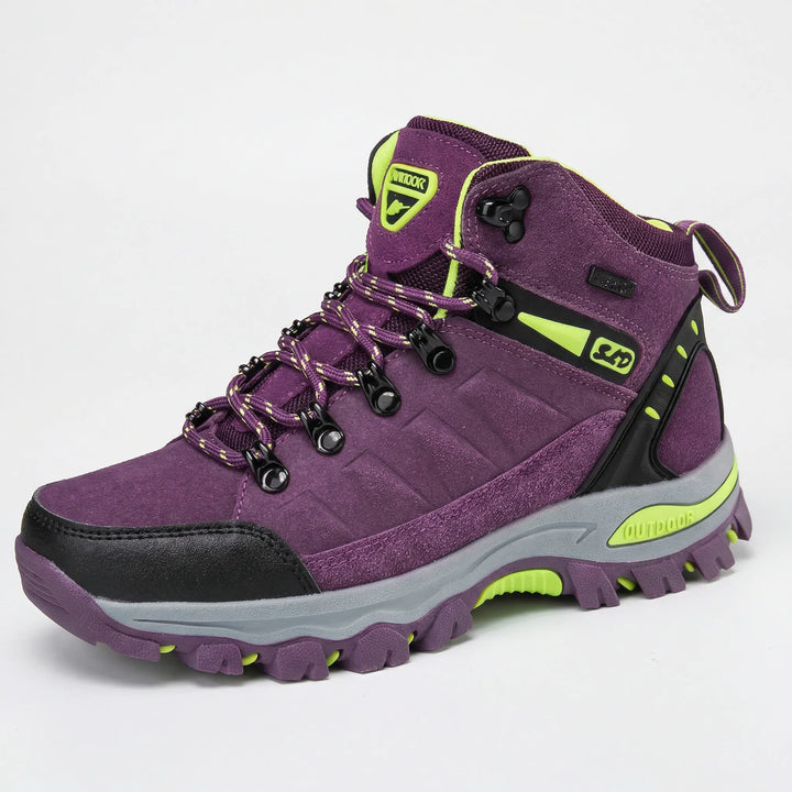 Explore trails in women's water-resistant hiking boots. Offers comfort, ankle support & grip for challenging adventures.