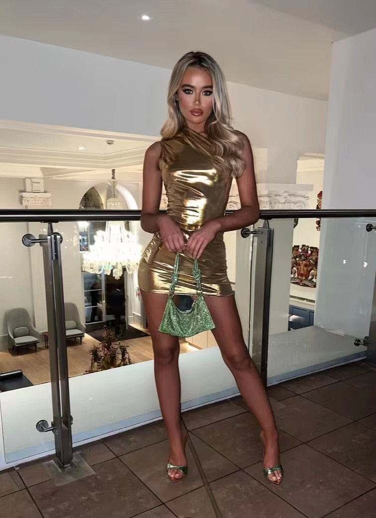 Elegant women's metallic mini dress with a glittering finish, ideal for cocktail parties & evening events.