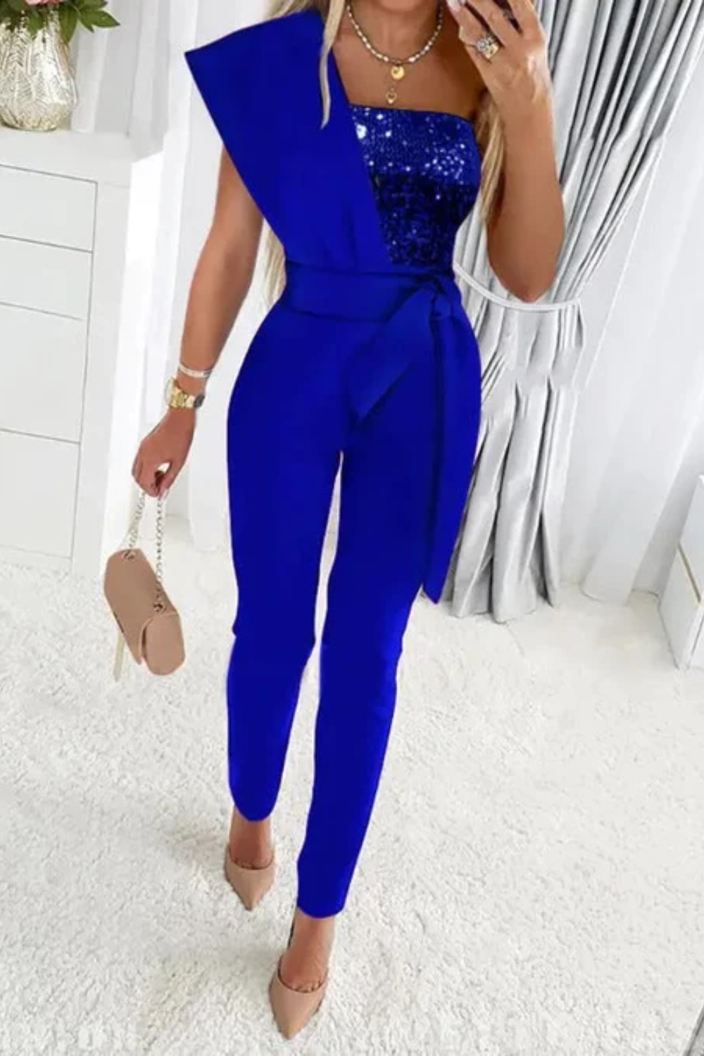 Stylish formal women's jumpsuit, a dazzling one-piece sequin outfit for cocktail parties & events.