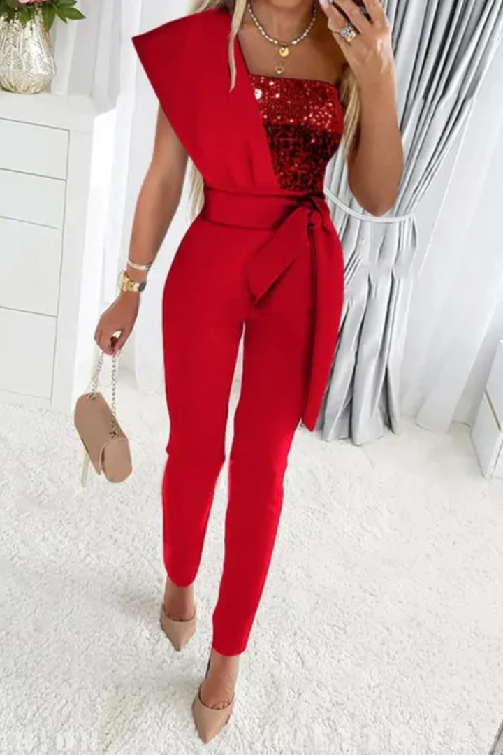 Model wearing a stunning shimmering sequin women's jumpsuit, showcasing its elegant fit for evening wear.