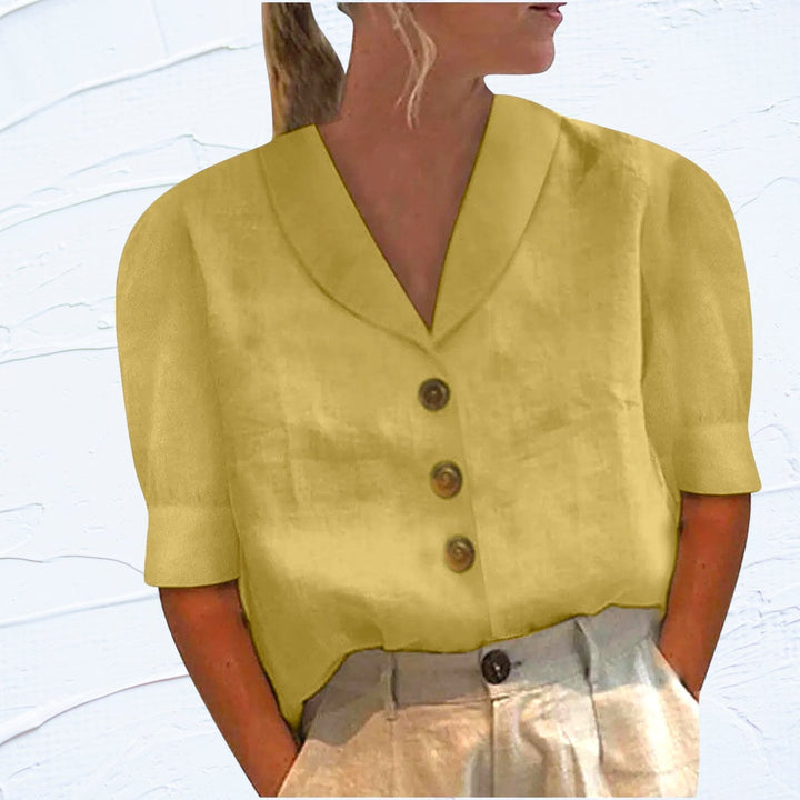 Lightweight women's short sleeve button-up shirt for daily wear. A versatile and comfortable top for warm weather.
