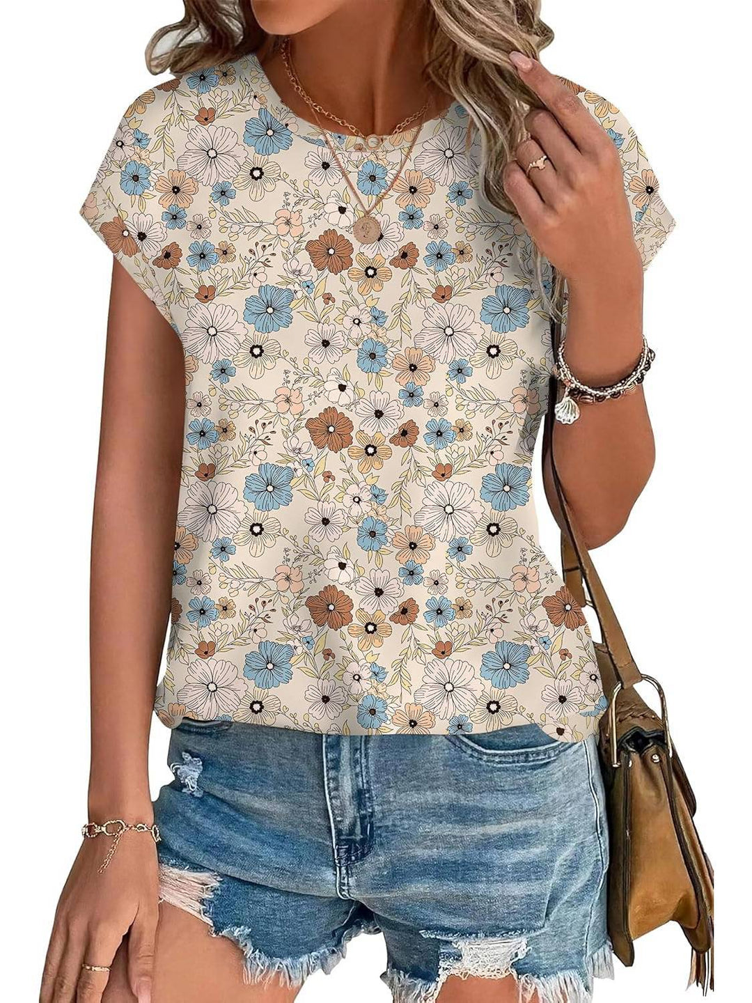 Women's botanical leaf print top, comfortable and lightweight. Crew neck, short sleeve casual wear.