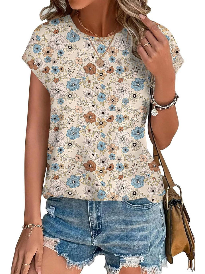 Women's botanical leaf print top, comfortable and lightweight. Crew neck, short sleeve casual wear.