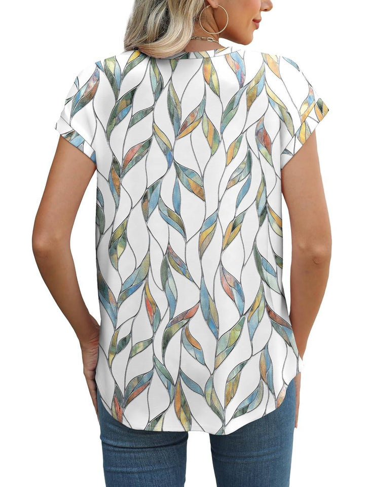 Summer style women's shirt: vivid leaf print, comfortable crew neck, short sleeves.