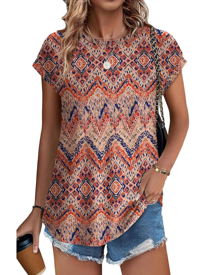 Women's spring fashion top with a beautiful leaf print and classic crew neck. Short sleeve.