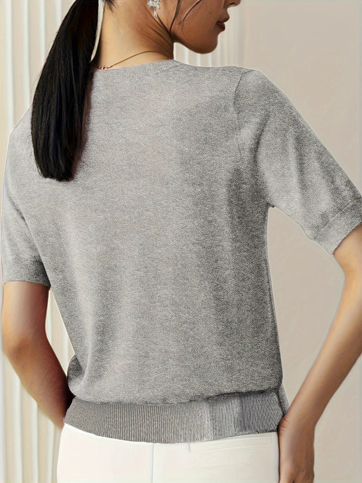 Essential women's short sleeve tee. Crew neck and ribbed hem for versatile styling.