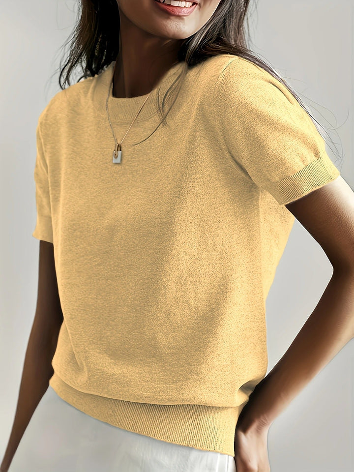 Women's versatile short sleeve crew neck tee with a refined ribbed hem.