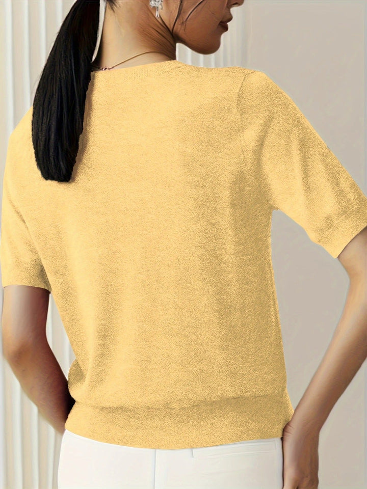 Women's short sleeve tee, perfect for layering, with crew neck and ribbed hem.
