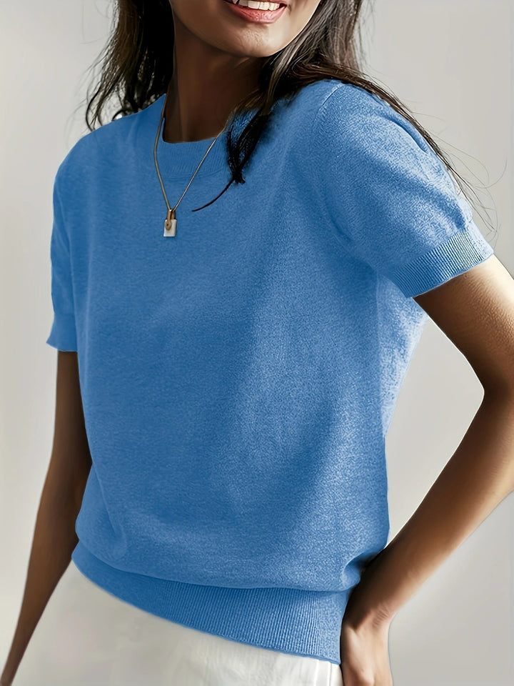 Casual-chic women's crew neck short sleeve top, defined by its ribbed hem.