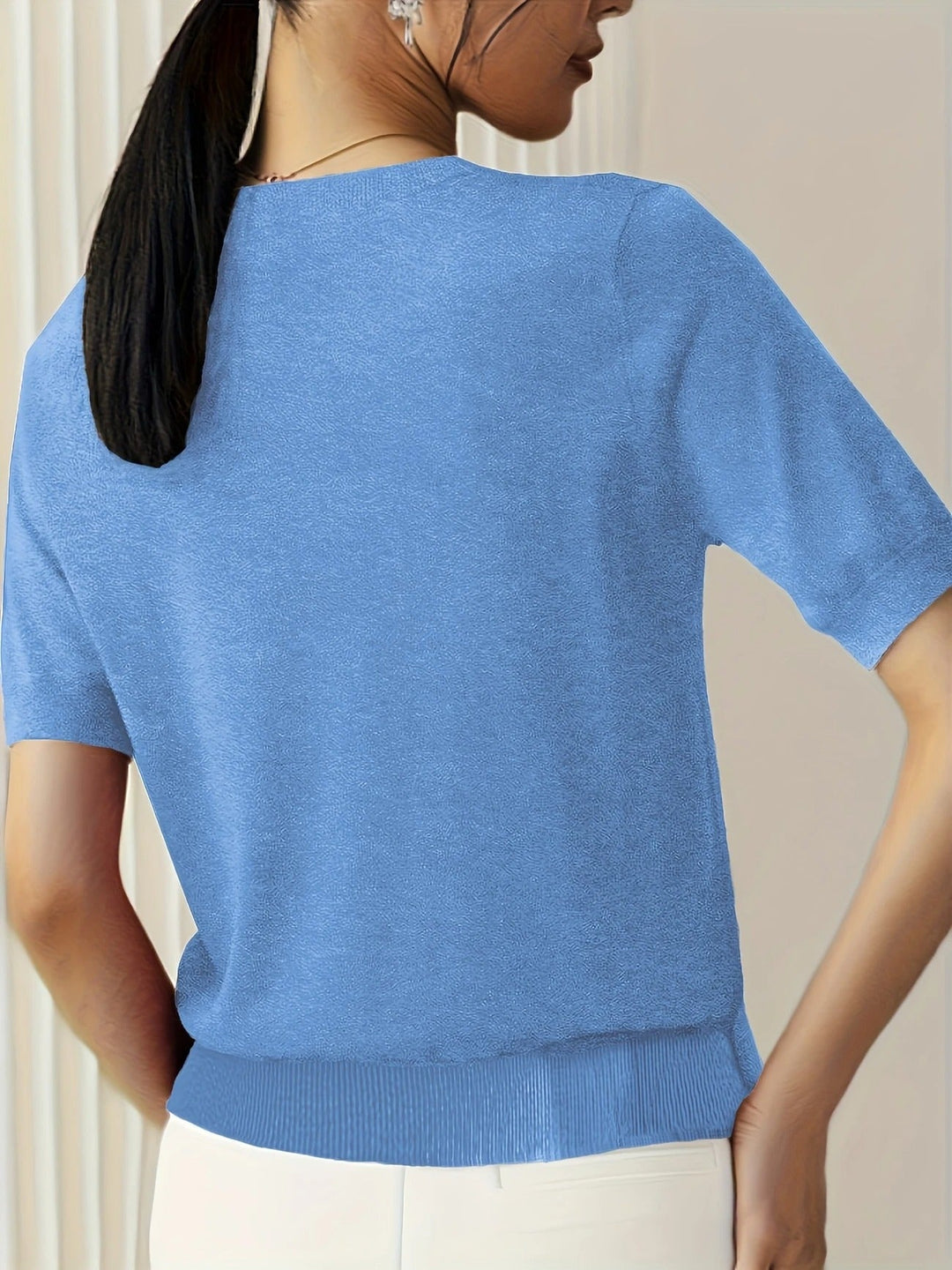 Flattering women's short sleeve crew neck tee. Elevated with a ribbed hem.
