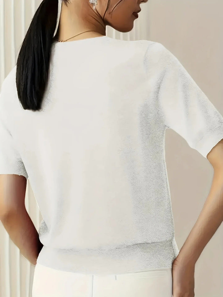 Women's short sleeve tee, ideal for casual outfits, featuring crew neck & ribbed hem.