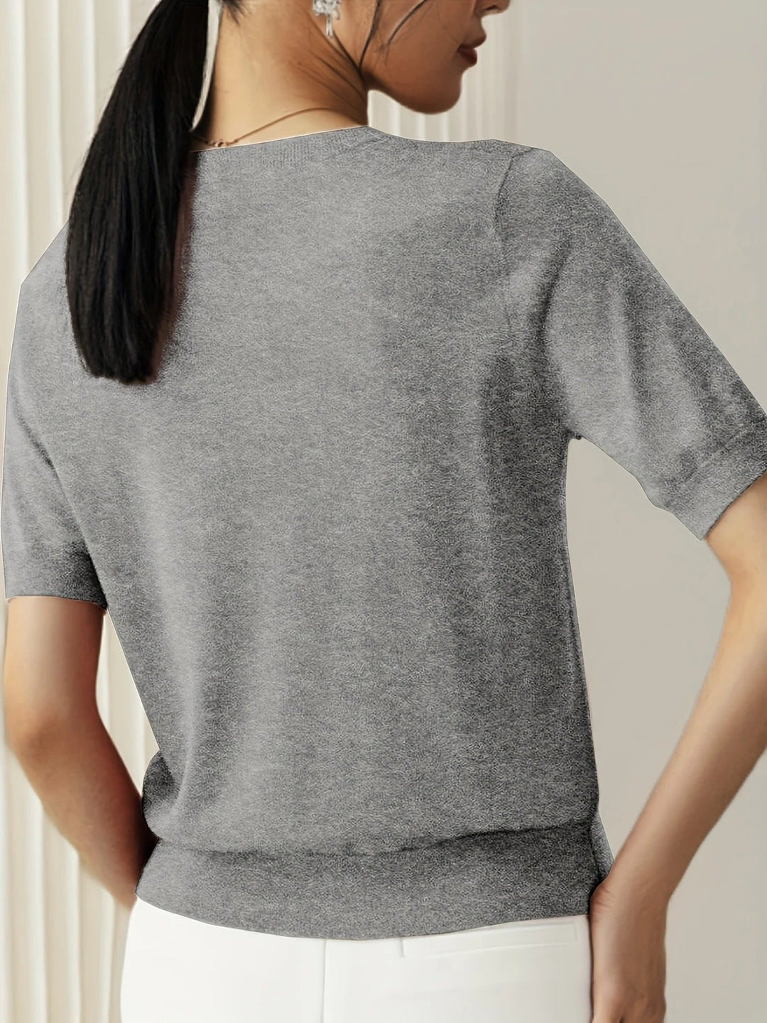Elevated basic women's short sleeve crew neck tee. Stylish ribbed hem detail.