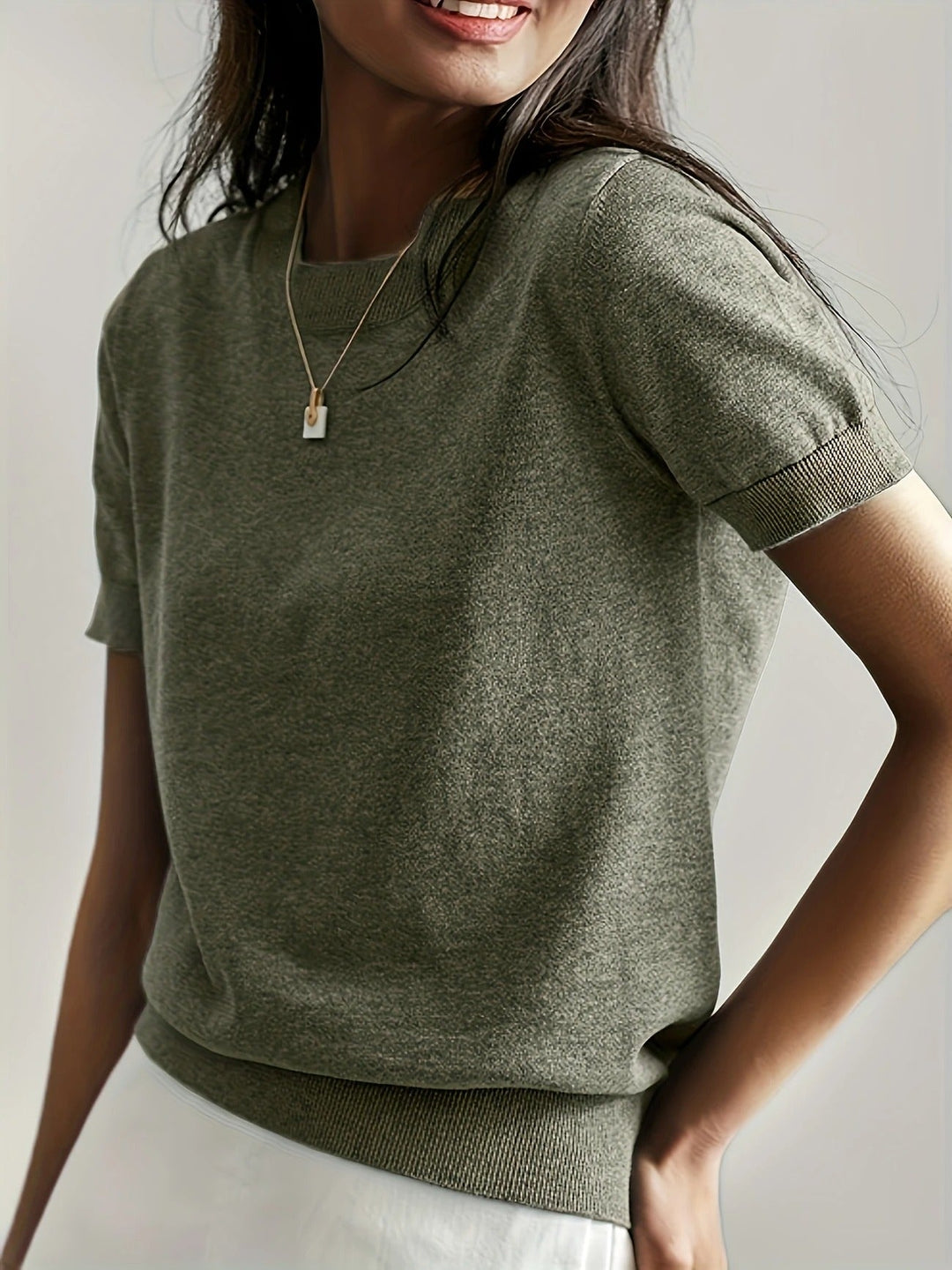Casual women's short sleeve tee with a classic crew neck and ribbed hem.
