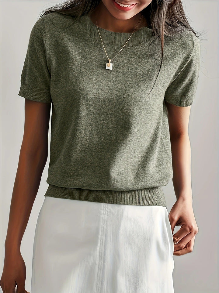 Versatile women's crew neck top. Short sleeve with a chic ribbed hem for everyday.