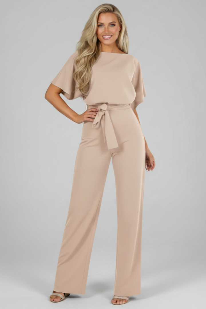Pink women's short sleeve playsuit with waist tie, a versatile fashion piece for summer and spring.