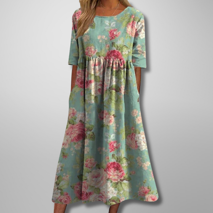 Comfortable women's loose fit midi dress with short sleeves & botanical print, ideal for everyday wear.