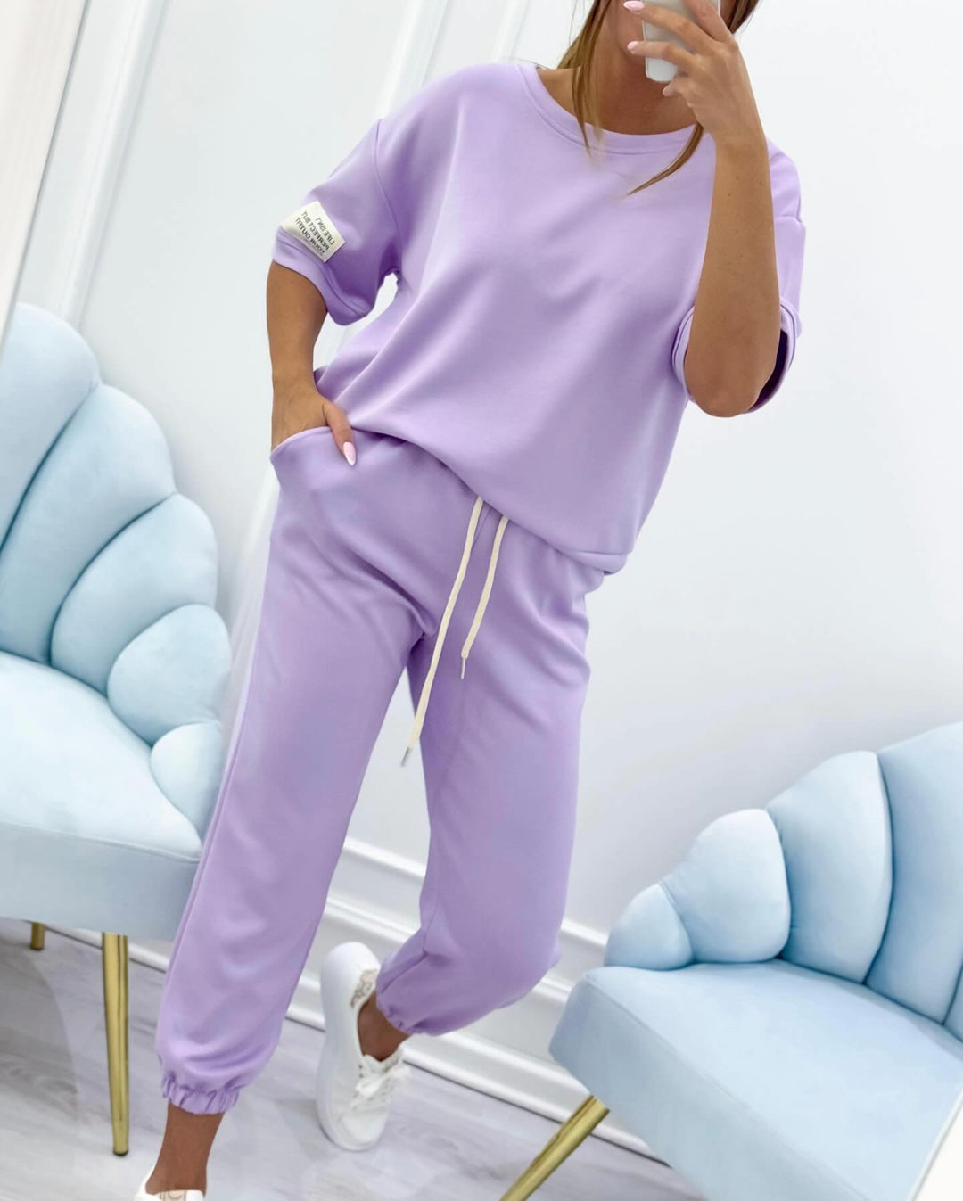 Stylish women's relaxed fit short sleeve set, ideal for summer casual wear & everyday comfort.